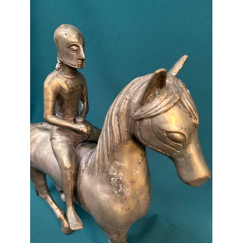 218 - Most unusual large vintage metal horse with Trojan warrior in full helmet. 43cm long X 44cm H