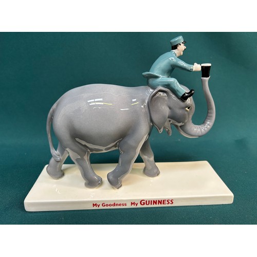 146 - A Coalport Limited Edition Guinness Elephant & Keeper, 108/800. 18cm H. With a box