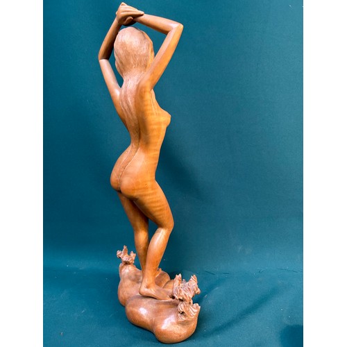 133 - A circa 1970's Balinese hand carved wooden figure of a nude lady - signed to base 