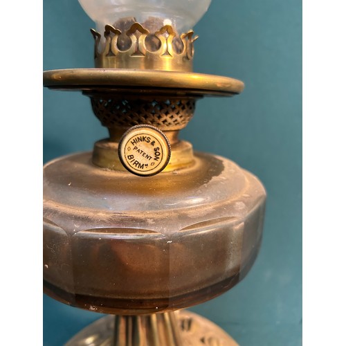 319 - A good late 19th Century Oil Lamp with cut glass font and Art Nouveau design brass stand. The burner... 