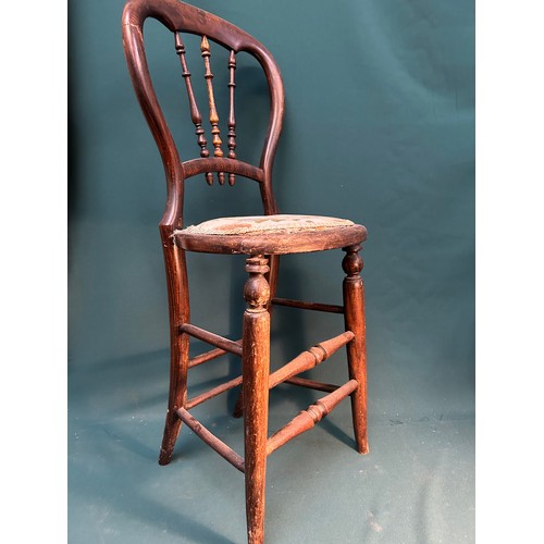 391 - A Victorian child's correction chair with balloon back & turned spindles. From a Norfolk country hou... 