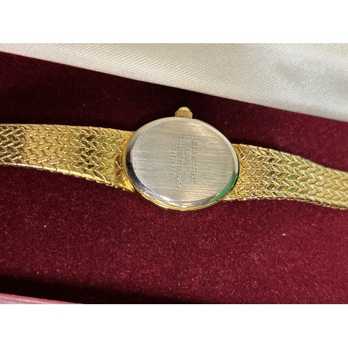 16 - A LADIES GOLD PLATED WRIST WATCH BY CONSTANT