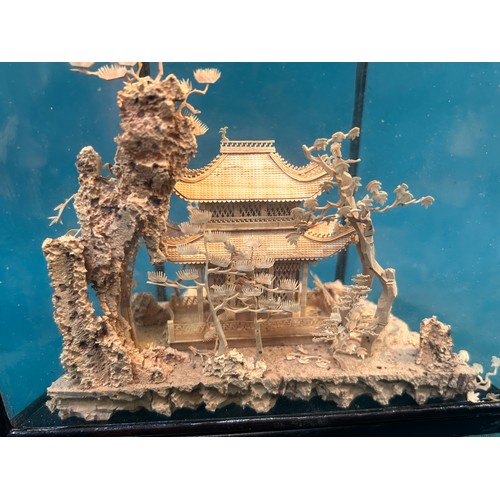 149B - A mid 20th Century Chinese cork diorama with a pagoda in a landscape - very fine carving, in a lacqu... 