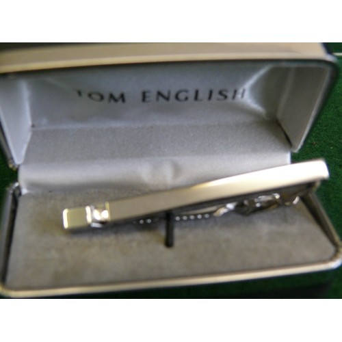 7A - SILVER COLOURED TIE PIN WITH A DIAMONTE FEATURE, IN A 'TOM ENGLISH' BOX.