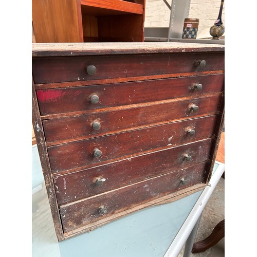 327F - A small antique mahogany 6 drawer tool chest, or collector’s chest with original brass knobs. Needs ... 