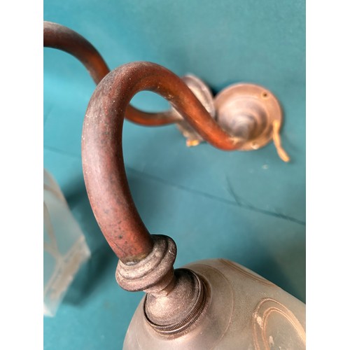 318D - A pair of Victorian brass armed gas wall lights with Art Nouveau style frosted & etched glass shades