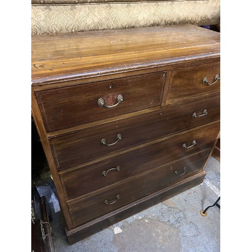 397 - An Edwardian 2 over 3 mahogany chest of drawers with original brass handles.