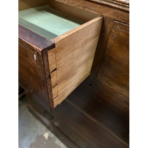 397 - An Edwardian 2 over 3 mahogany chest of drawers with original brass handles.