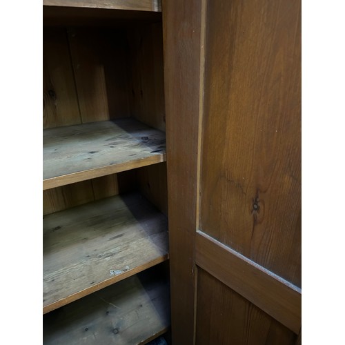 398 - A Victorian painted pitch pine housekeepers cupboard from a Norfolk country house. With panelled doo... 