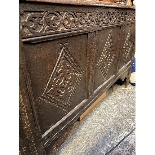 350 - Large late 17th or early 18th Century 6 plank coffer. The front with three carved panels below a car... 