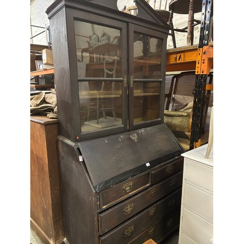 402 - Georgian oak bureau bookcase from a Norfolk country house. With 2 over 3 drawers, on raised bracket ... 