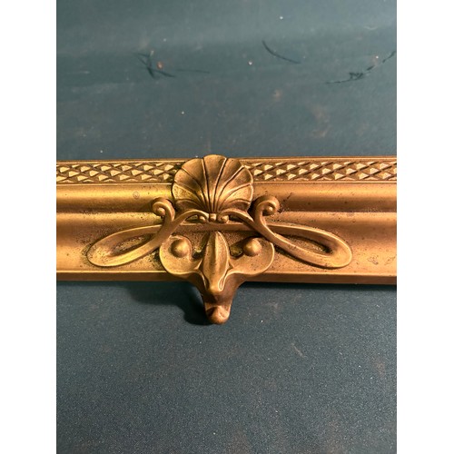 327 - An Edwardian style brass fender with Art Nouveau detail to front - 122cm long X 32cm deep