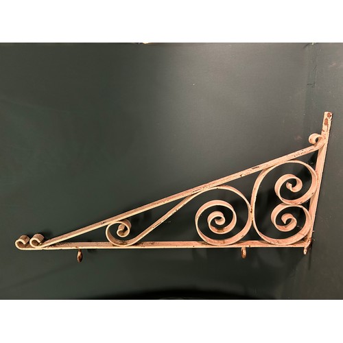 327C - A large Victorian wrought iron wall bracket for a pub or shop sign- with metal loops for hanging a w... 