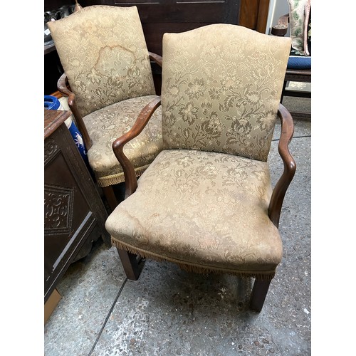 380 - Pair of 1920's mahogany framed armchairs with upholstered sprung seats.