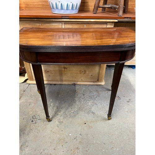 356 - Georgian mahogany D shaped mahogany card table, the fold over top with reeded edge. On square tapere... 