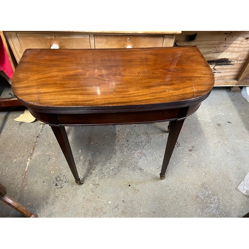 356 - Georgian mahogany D shaped mahogany card table, the fold over top with reeded edge. On square tapere... 