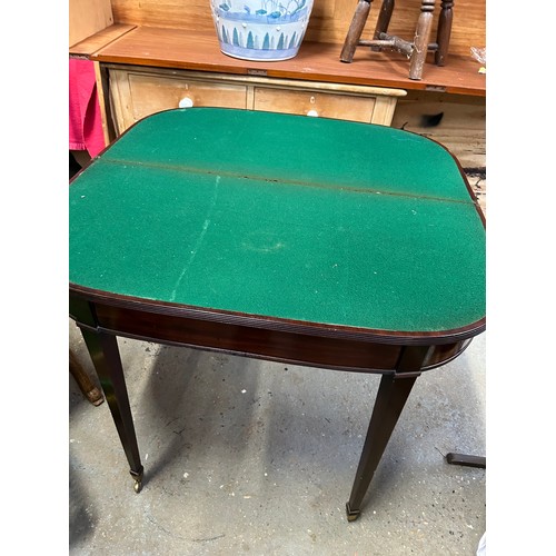 356 - Georgian mahogany D shaped mahogany card table, the fold over top with reeded edge. On square tapere... 