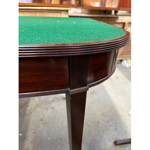 356 - Georgian mahogany D shaped mahogany card table, the fold over top with reeded edge. On square tapere... 