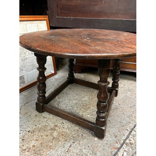 353 - Antique oak low table with circular top and turned legs. Made up probably in the 1920's from earlier... 