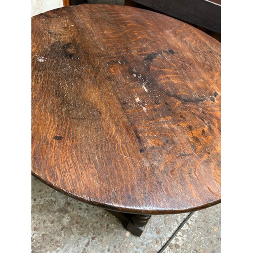 353 - Antique oak low table with circular top and turned legs. Made up probably in the 1920's from earlier... 