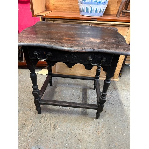 352 - Antique oak side  table with shaped top, turned legs, drawer with carved front and carved apron belo... 