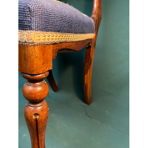 344 - A very elegant Victorian rosewood chair with hand worked tapestry seat