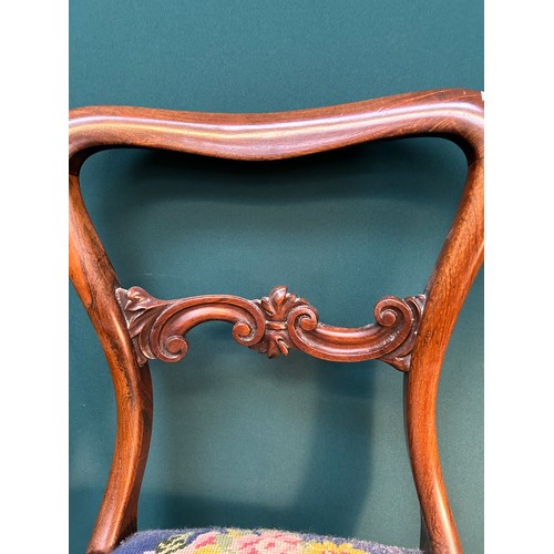 344 - A very elegant Victorian rosewood chair with hand worked tapestry seat