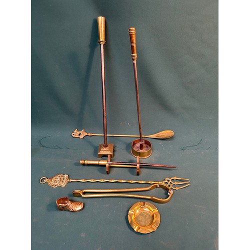 322 - Vintage brassware including a WW1 trench art poker on shell case stand, 2 further pokers with stands... 