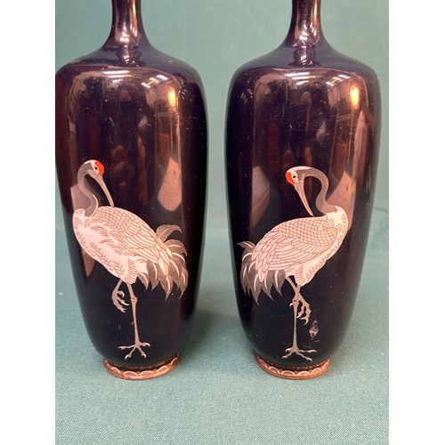 4 - A beautiful pair of Japanese Cloisonne vases from the early 20th Century depicting cranes with white... 