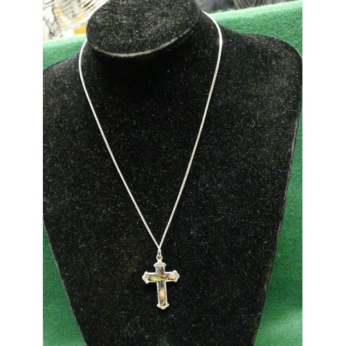 31A - A SILVER CHAIN AND CROSS WITH ABALONE  SHELL ON FRONT