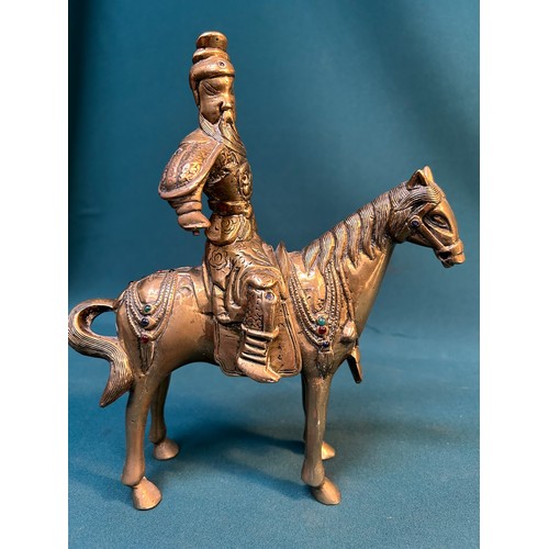 219 - Vintage solid brass warrior figure, possibly Genghis Khan on horseback, inlaid with coloured stones.... 