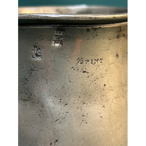 140 - Various items of pewter to include - 6 antique pewter half pint tankards, one engraved 