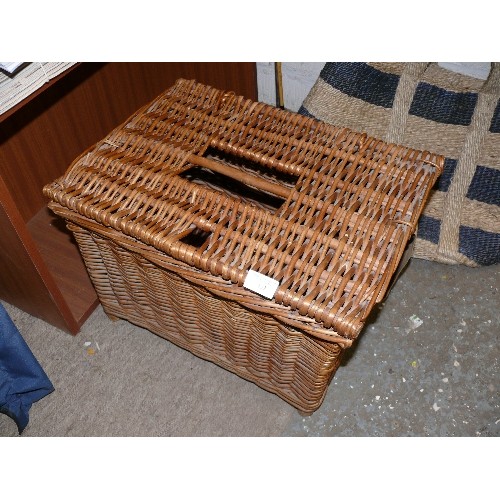 137 - A LARGE WICKER BASKET WITH CARRY STRAP