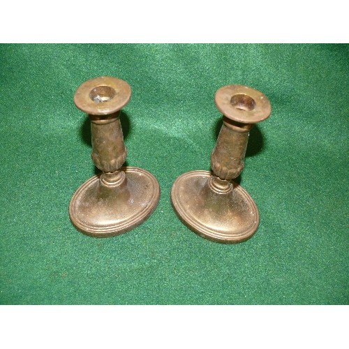 239 - A PAIR OF MATCHING BRASS CANDLESTICKS