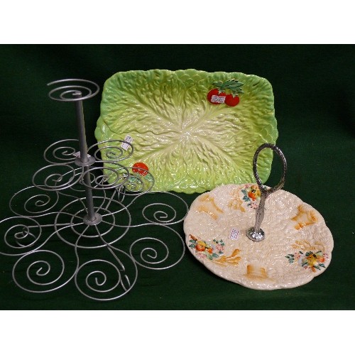 88 - A CLARICE CLIFF CAKESTAND, BESWICK CABBAGE LEAF SERVING DISH AND A METAL CAKE STAND