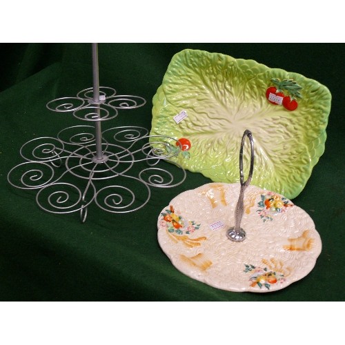 88 - A CLARICE CLIFF CAKESTAND, BESWICK CABBAGE LEAF SERVING DISH AND A METAL CAKE STAND