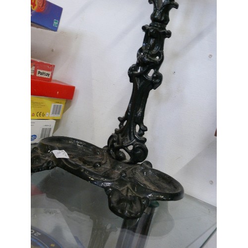 123 - A CAST IRON UMBRELLA STAND