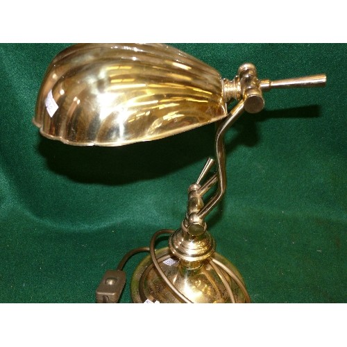 151 - A BRASS DESK LAMP WITH A METAL SHELL SHAPED SHADE