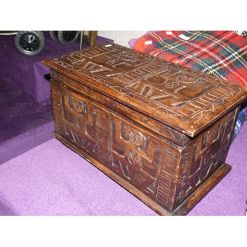 183 - A DECORATIVE CARVED WOODEN CHEST