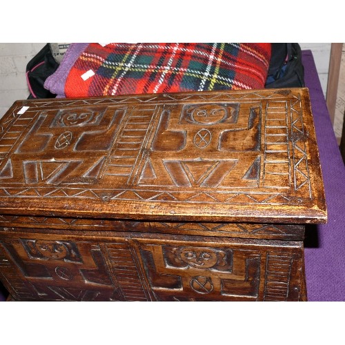 183 - A DECORATIVE CARVED WOODEN CHEST