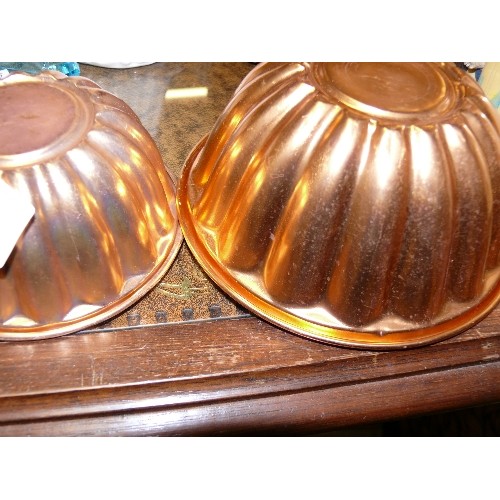 195 - A PAIR OF COPPER JELLY MOULDS, WOODEN TORTOISE TRINKET POT AND FOUR COLOURFUL GLASS ASHTRAYS.