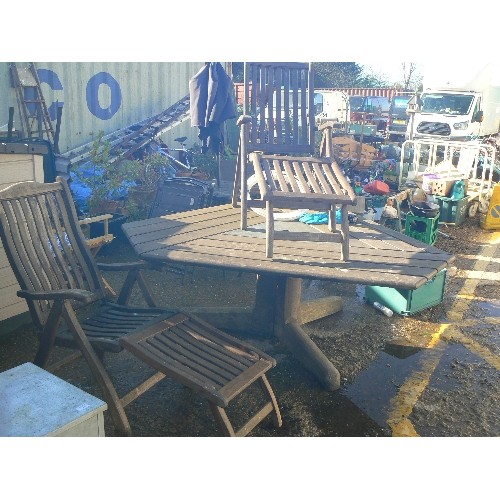 388 - LARGE TEAK TRIANGULAR TABLE WELL MADE STUNNING PIECE WITH TWO TEAK CHAIRS WITH REMOVABLE FOOTRESTS.