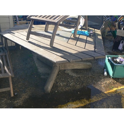 388 - LARGE TEAK TRIANGULAR TABLE WELL MADE STUNNING PIECE WITH TWO TEAK CHAIRS WITH REMOVABLE FOOTRESTS.