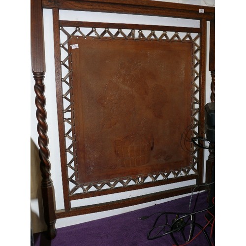 115 - A DECORATIVE WOOD AND LEATHER FIRE SCREEN