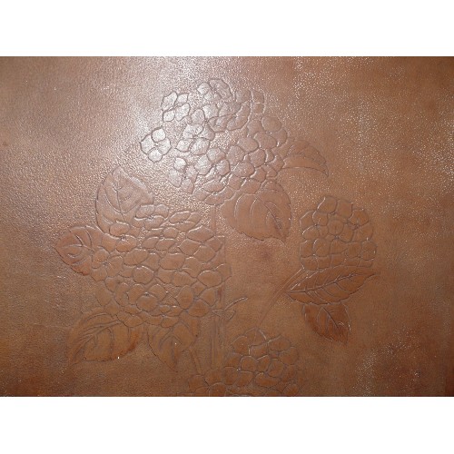 115 - A DECORATIVE WOOD AND LEATHER FIRE SCREEN