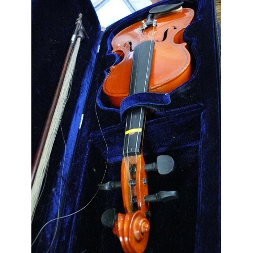 179 - A VIOLIN AND BOW IN FITTED CASE, VIOLIN NEEDS SOME ATTENTION.