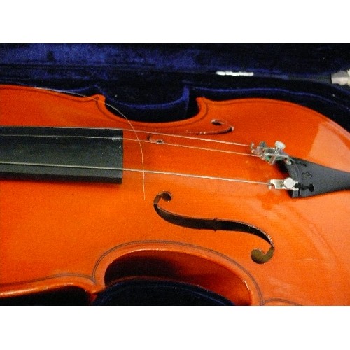 179 - A VIOLIN AND BOW IN FITTED CASE, VIOLIN NEEDS SOME ATTENTION.