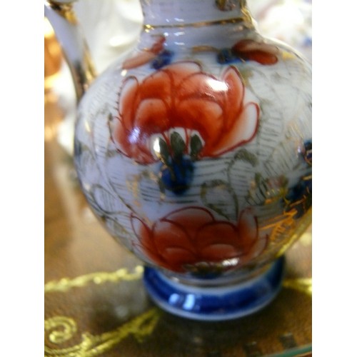 191 - A PAIR OF DECORATIVE ORIENTAL STYLE JUGS PLUS A MATCHING VASE.