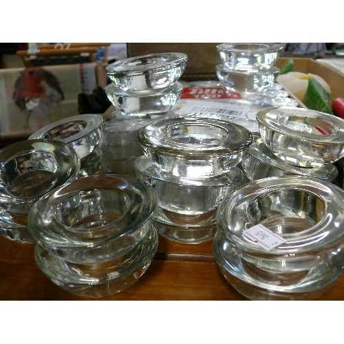 274 - 100 TEALIGHT CANDLES, MADE IN ITALY, SEALED PLUS A QUANTITY OF GLASS TEALIGHT HOLDERS.