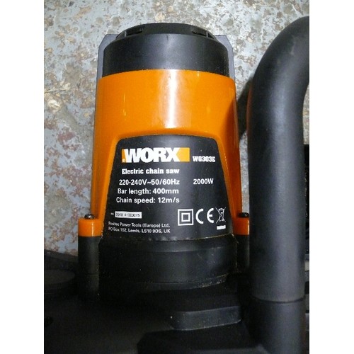 303 - WORX ELECTRIC CHAINSAW WITH SPARE BLADE AND OIL